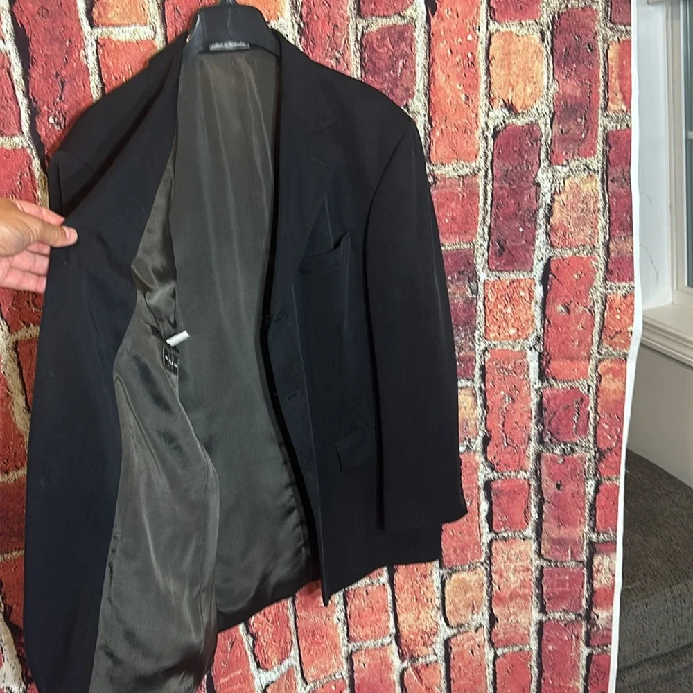 Oscar de la Renta used excellent